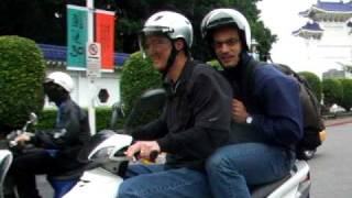 preview picture of video 'Two white guys riding a scooter in Taipei City, April, 2009.'