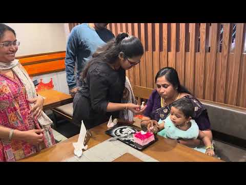 Mayukha playing with cake