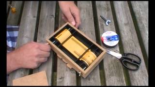 Loading my home made pinhole camera with 120 rollfilm