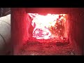 Rocket heater burning neat sawdust