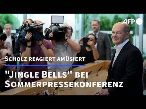 Video Thumbnail: "Jingle Bells"-Handy bei Scholz-Pressekonferenz: "Kein Cyber-Angriff" | AFP