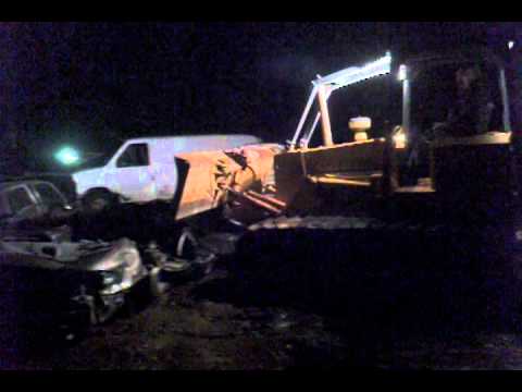 How to crush a car with a bulldozer.