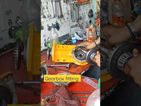 Gear box parts fitting in power tiller by professional