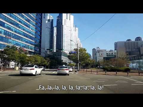 vista da cidade: Centum Middle School e Bexco, Busan, Coreia, com a música