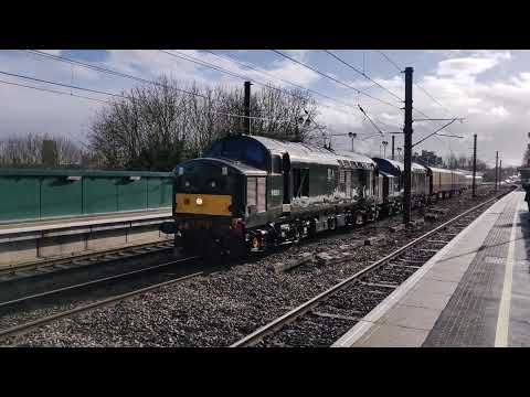 Locomotive Services 37667 (D6851) and 37521 (D6817) pass Durham