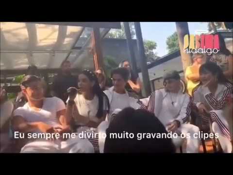 Bailey and Noah sitting next to and watching Sabina who puts her arm on Bailey's arm March 7, 2020