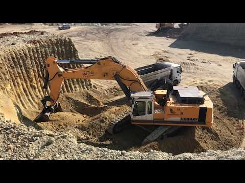 Liebherr 974 Excavator Loading Trucks