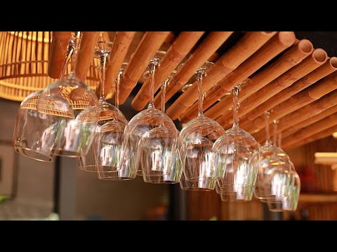 Video Thumbnail: Cypriot performer balances 416 glasses on head for Guinness record win
