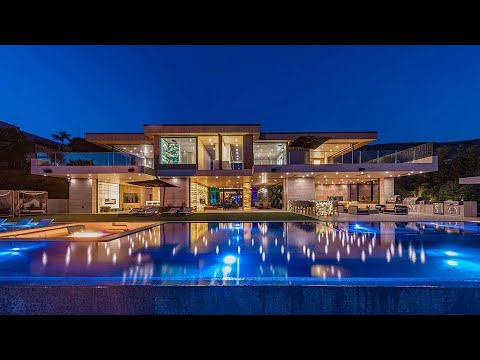58.8 Million! Modern Zen Malibu compound featuring 20,000 SF of living space with a magnificent pool