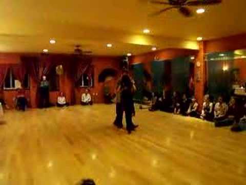  Luciana Valle  and  Alex Krebs  are  dancing  to  a  tango