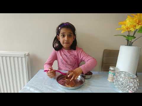 Chocolate sprinkles biscuit by 6 year old Risha