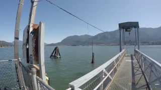 preview picture of video 'tugboat pushing two barges on Columbia River, 4k'