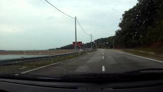 preview picture of video 'Penang - passing by Teluk Bahang Dam on federal route 6'