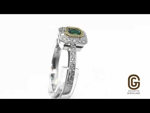 Emerald and diamond dress ring