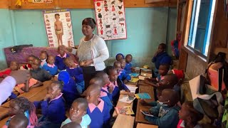 Supplying food to Nairobi Kibera (slums) school