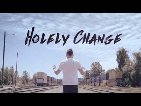 Holely Change (DVD and Gimmicks) by SansMinds Creative Lab