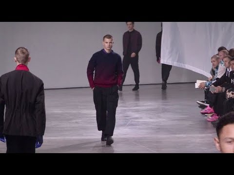 Models and designer on the runway for the Issey Miyake Men Fashion Show in Paris