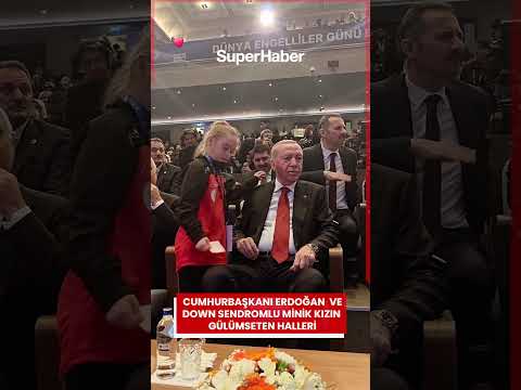 Smiling moments between President Erdoğan and the little girl with Down Syndrome.