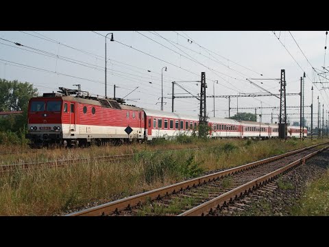 ŽSSK 163-114 durchfährt mit einem Personenzug langsam Trebišov