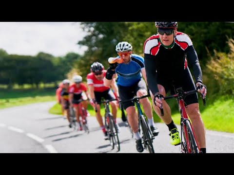 Can large groups of cyclists ride side-by-side and proceed as one at stop signs?
