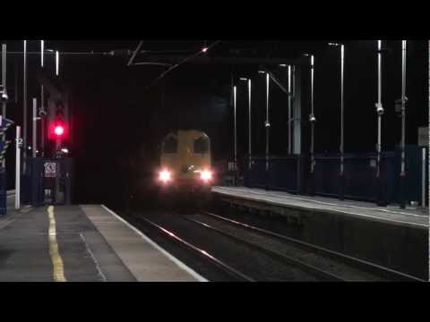 DRS 20304 & 20301 (20305 & 20302 on the rear) thrash through Harpenden - 6M20