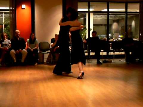  Alex Krebs  and  Jenna Rohrbacher  are  dancing  to  the  tango  or  milonga  "  Trasnochando  "  or  "  Saca Chispas  "  by  Miguel Caló  or  Julio de Caro