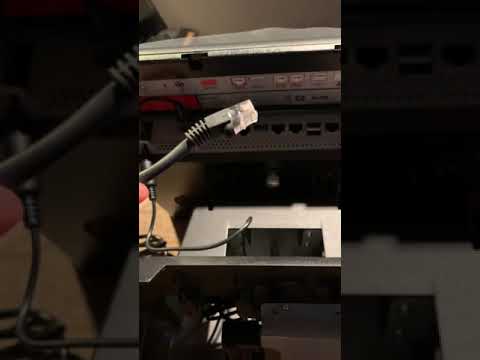 Cat5 connection to LAN port indicating link with blinking lights