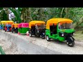 Satisfying Toy Colorfull CNG Auto Rickshaws Hand Driving On Boundary Wall