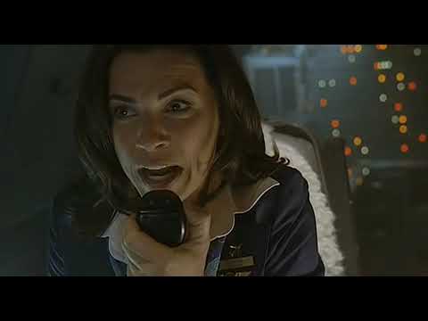 Trailer frame: overhead aisle chaos as passengers barricade with luggage and the score surges