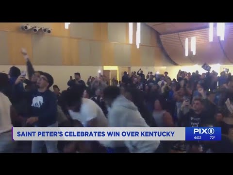 Students celebrate after St. Peter's stuns Kentucky