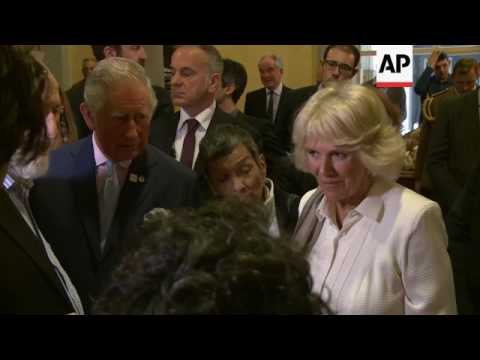 Prince Charles and Duchess of Cornwall sample Italian food in Florence