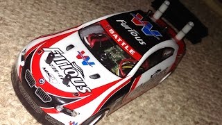 preview picture of video 'Turnigy TZ4 AWD with SINOHOBBY BMW Furious body shell on racetrack'