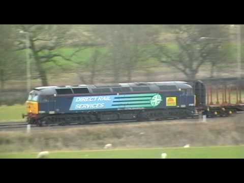 DRS/Colas 57002 6C19 Chirk - Carlisle empty logs 23/3/10