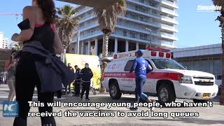 Izraelskie miasto oferuje bezpłatne napoje, aby zachęcić młodych ludzi do szczepień przeciwko COVID-19