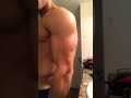Young bodybuilder flexing day 5