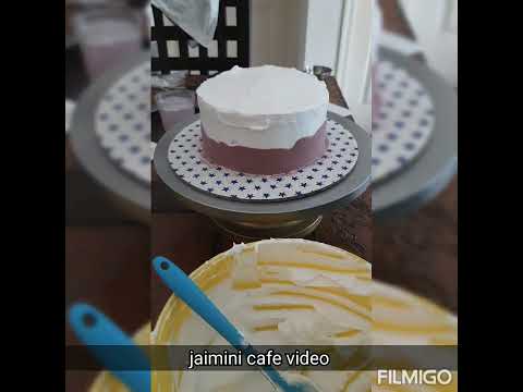 Fault line cake. Mix fruit cake. Chocolate bowl with fruits on the cake.