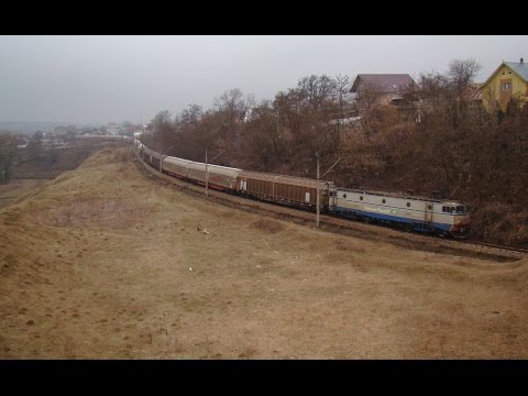 Tren de marfa Unicom Tranzit cu 25 vagoane trece prin Scheia tras de EA386 - 15.03.2015