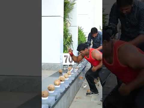 Most coconuts smashed with one hand in one minute - 112 by Abheesh P. Dominic 🇮🇳