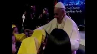 Our Pope smiles as Jamie Rivera sing a song