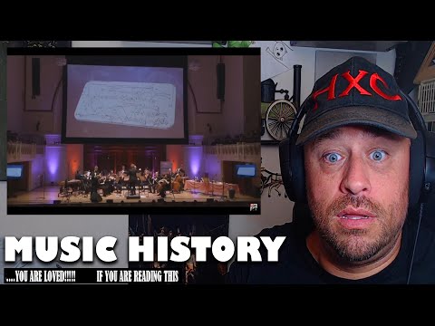 🤣 Orchestra plays THE HISTORY OF MUSIC - cavemen to Barbie REACTION!