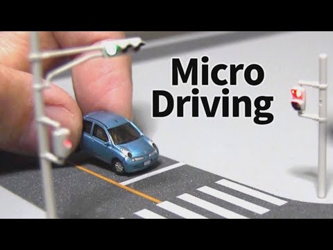1/150 scale Car System in which the car runs along wires underneath the roads