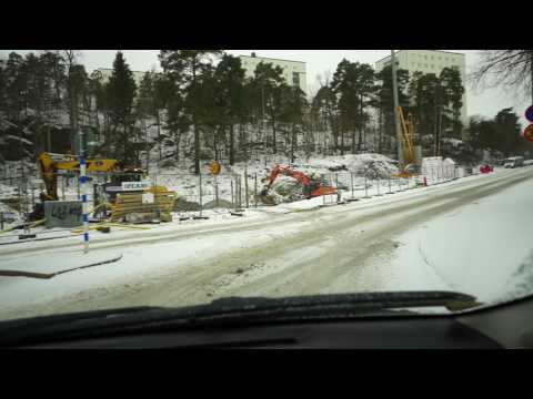 Sweden, driving from Rågsved Centrum to Hagsätra bus stop in snowy weather