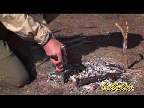 Cooking A Fish Over A Fire