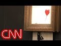 Watch Banksy's $1.4 million painting 'self-destruct'