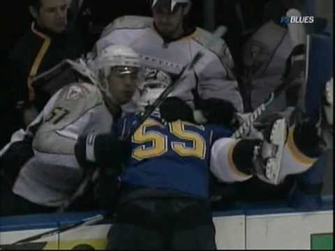 Cam Janssen hits Wade Belak into the bench.mpg