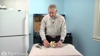 Refrigerator Repair: Replacing the Evaporator Fan Grommet - Red (GE Part # WR02X12008)