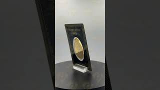 Un alliage avec un pendentif en or BTC 24 carats avec le mot « Ummy » pesant 31,45 grammes