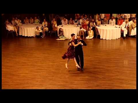  Claudia Codega  and  Esteban Moreno  are  dancing  to  the  milonga  "  La Espuela  "  by  Juan D'Arienzo  at  White Nights tango festival  in  2017