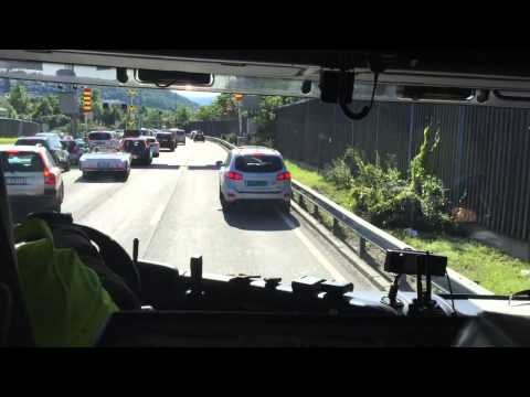 Norwegian fire department responding to a car crash during rush hour traffic