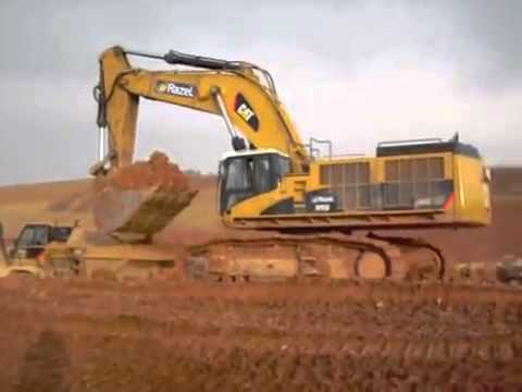 CAT 385C Excavator loading Dump truck